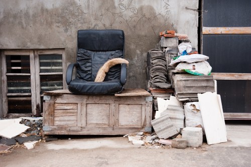 Professional team clearing office furniture in Canary Wharf