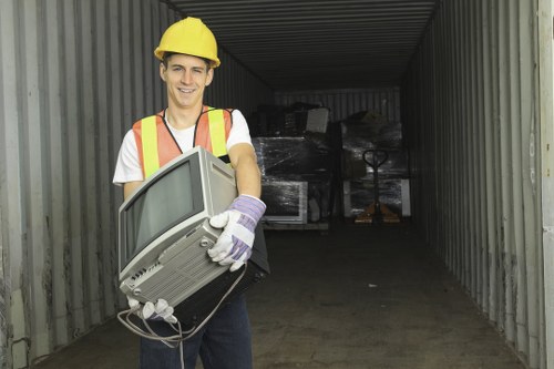 Recycling bins and materials at a construction site